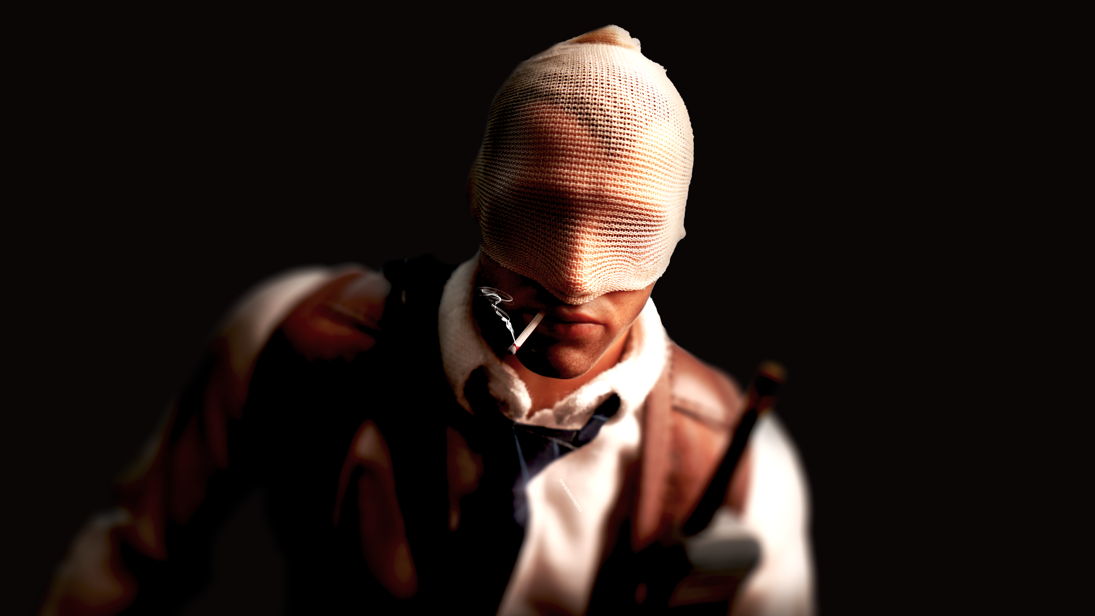 Agent number K smoking a cigarette black background